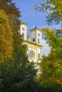 Catholic church and autumn in the small west Bohemian spa town Marianske Lazne Marienbad - Czech Republic Royalty Free Stock Photo