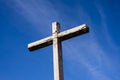 Catholic church cement cross against blue sky Royalty Free Stock Photo