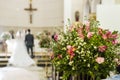 Catholic church decoration for wedding ceremonies - bride and groom on the bare bottom - Royalty Free Stock Photo