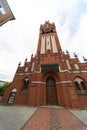 Catholic church of Holy Family in Russia, Kaliningrad city. Neogothic red brick building style. Inscription