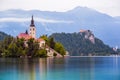 Catholic Church on Island and Bled Castle on Bled Lake Royalty Free Stock Photo