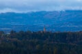 Catholic church in small Czech village Hosin in autumn landscape at blue hour Royalty Free Stock Photo