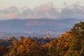 Catholic church in small Czech village Hosin in autumn landscape at sunrise Royalty Free Stock Photo