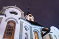 Catholic church in small town at night