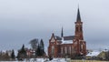 Catholic church of St. Anthony of Padua in Pastavy in winter. Monument of architecture in the neo-Gothic style.
