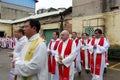 Catholic clergy queuing to enter the church Royalty Free Stock Photo