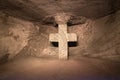 Catholic cross carved into a wall of the Salt Cathedral in Colombia. Royalty Free Stock Photo