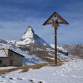 Catholic cross on the Riffelberg and Matterhorn Royalty Free Stock Photo