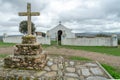 catholic crucifix in stone on the left side, chapel sra das Neves on the right side. Castelo Branco District