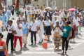 Catholic faithful participate walking in the Corpus Christ proce