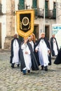 Catholic faithful walk the streets of Pelourinho with banners du