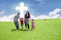 Catholic family at the Cross Royalty Free Stock Photo