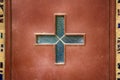 Catholic glazed Cross on the Church door Royalty Free Stock Photo