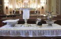 Catholic liturgical object. Chalice, communion wafers, wine, water, ewer and basin Royalty Free Stock Photo