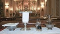 Catholic liturgical object. Chalice, communion wafers, wine, water, ewer and basin Royalty Free Stock Photo