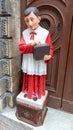 Catholic monk asking for money for the mercy box