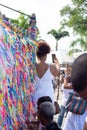 Catholic people are seen placing ribbons on the railing of Senhor do Bonfim church Royalty Free Stock Photo