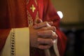 Catholic priest on altar praying during mass Royalty Free Stock Photo