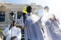 Catholic seminarians prepare with incense for the Palm Sunday procession