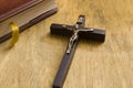 Catholic wooden crucifix and book Royalty Free Stock Photo