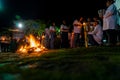 Catholics are around the holy bonfire, on the hallelujah Saturday night, to light their candles. Holy week in Valenca, Bahia