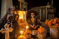 Mexican Catrina and Catrin at a cementery