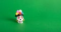 A Catrina La Calavera Garbancera , Dapper Skeleton, Elegant Skull on a green background