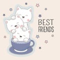 Cats best friends sitting in blue cup of coffee Isolated on pink background