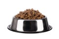 Cats and dogs dry food in a stainless steel bowl on a white background. Pet kibble food in bowl Royalty Free Stock Photo