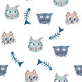 Cats and fish seamless pattern. Cute kitten faces and fish skeleton. Creative nursery background. Perfect for kids design, fabric Royalty Free Stock Photo