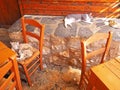 Cats relax at an outdoor restaurant in Greece