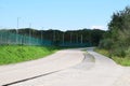 Cattenom, France - 08 22 2023: Country road curves at the Nuclear plant Cattenom