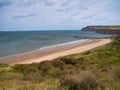 Cattersty Sands Beach and jetty, Skinningrove on the coast of the North York Moors, Yorkshire, UK