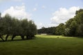 Cattle Farm Land With Farm House In The Distance