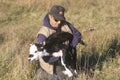 Cattle farmer holding calf