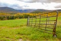 Cattle Gate by Field in Mountains