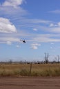 Cattle mustering with helicopter and motorbikes in Queensland