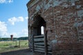 Cattle paddock from brick old church Royalty Free Stock Photo