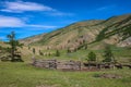 A cattle pen in the Mongolian mountains, surrounded by grassland Royalty Free Stock Photo