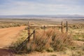 Cattleguard and Fence Barbed Wire Western Scene Royalty Free Stock Photo