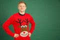 Caucasian adult male wearing red christmas jumper