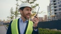 Caucasian aggressive annoyed worker man in hardhat angry mad furious architect engineer contractor shouting screaming Royalty Free Stock Photo