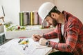 Young architect working on an office desk Royalty Free Stock Photo