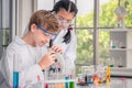 Students using microscope in science laboratory class Royalty Free Stock Photo