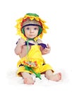 Caucasian baby boy in a sunflower fancy dress