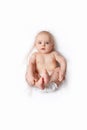 Caucasian baby on white blanket. Top view. Royalty Free Stock Photo