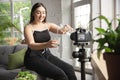 Caucasian blogger woman make vlog how to diet and lost weight. Lifestyle, influencer women, healthy concept.