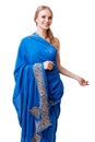 Caucasian young woman in blue indian national dress isolated