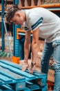 Caucasian Boy in charge in a warehouse reviewing safety regulations