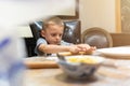 Little boy learning how to make dumplings Royalty Free Stock Photo